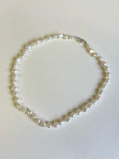 White pearl necklace

