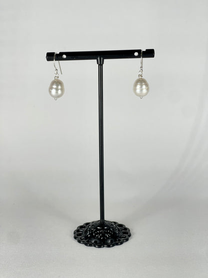 Silver single drop earrings with a white round pearl